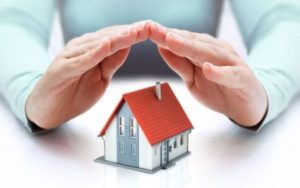 When should I effect building and life insurance when purchasing a property?